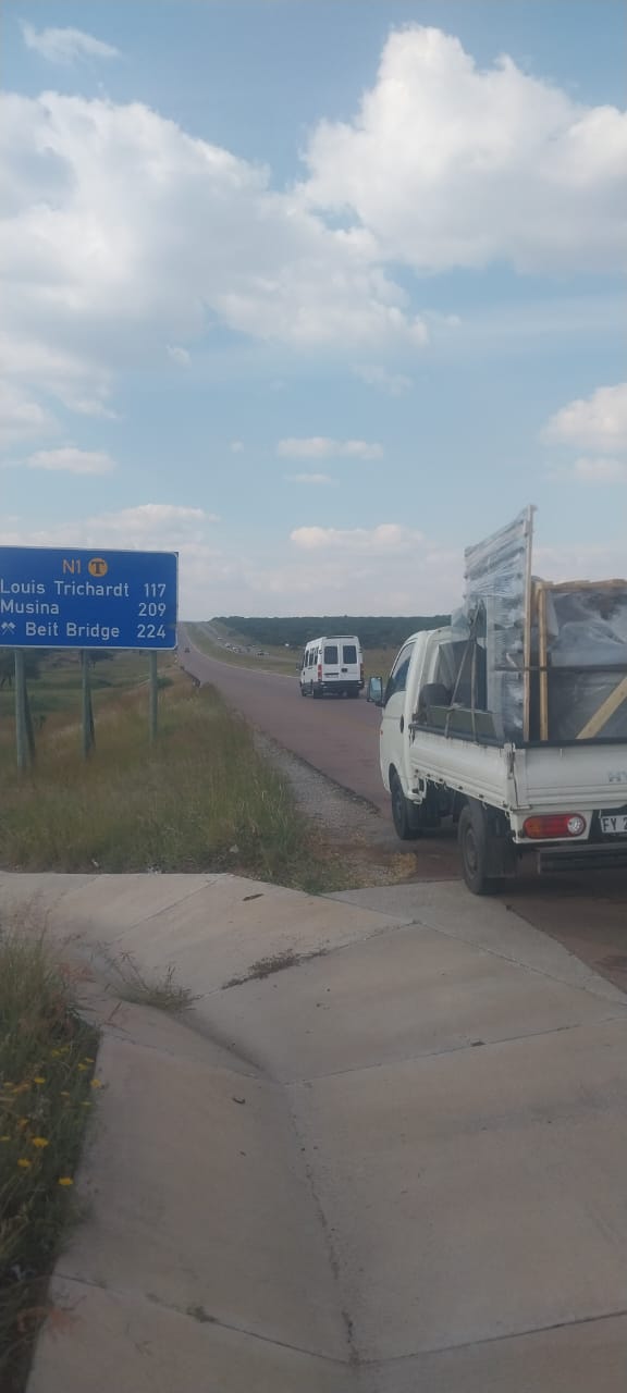 Mj Movers transport truck on the road